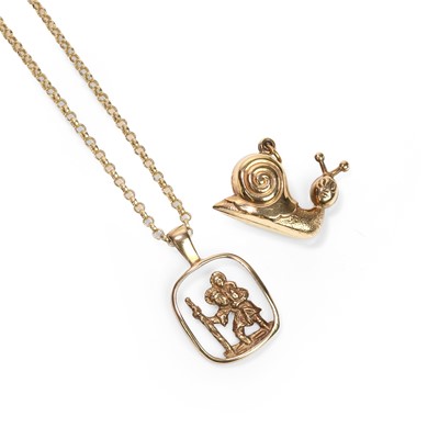 Lot 301 - A 9ct gold pendant and a 9ct gold snail charm