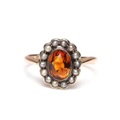 Lot 44 - A citrine and split pearl ring