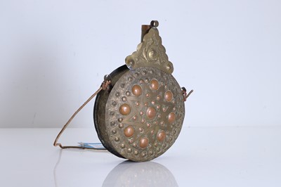 Lot 304 - A North African copper and brass powder flask