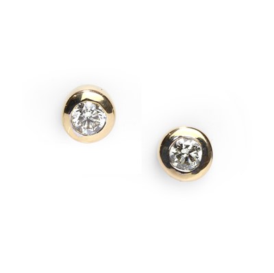 Lot 60 - A pair of 18ct gold diamond single stone stud earrings