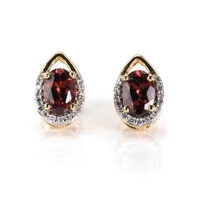 Lot 126 - A pair of 18ct gold red zircon and diamond earrings