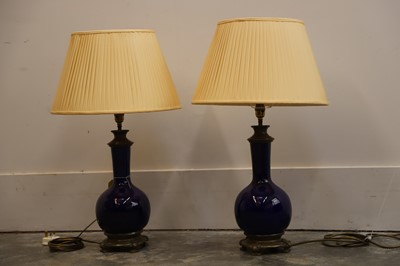 Lot 472 - A pair of blue glazed table lamps