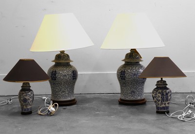 Lot 473 - A pair of modern Chinese blue and white table lamps