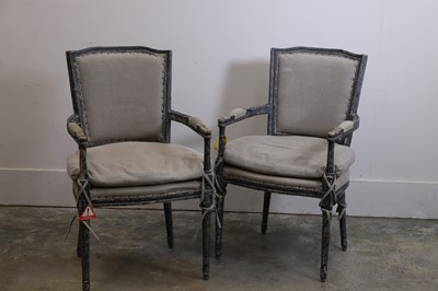 Lot 507 - A pair of painted elbow chairs