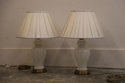 Lot 471 - A pair of opaline table lamps