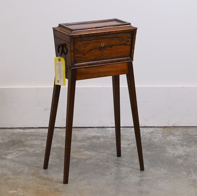 Lot 508 - A rosewood tea caddy on stand