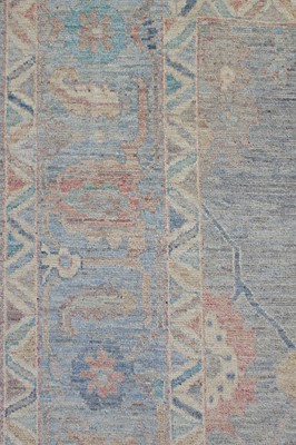 Lot 135 - An Oushak wool carpet