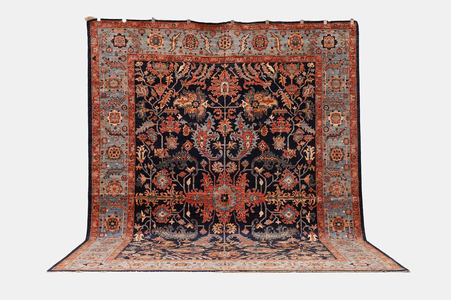 Lot 77 - A wool carpet of antique Heriz design
