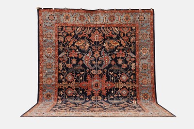 Lot 77 - A wool carpet of antique Heriz design