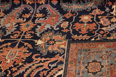 Lot 77 - A wool carpet of antique Heriz design