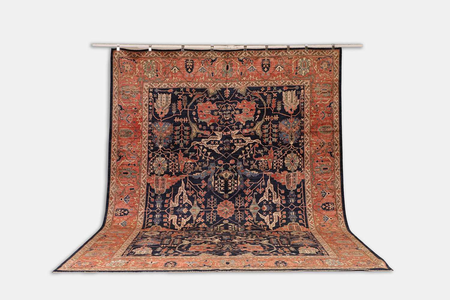 Lot 30 - A wool carpet of Persian Heriz design