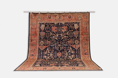 Lot 30 - A wool carpet of Persian Heriz design