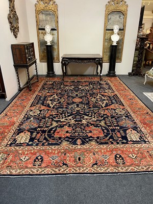 Lot 30 - A wool carpet of Persian Heriz design