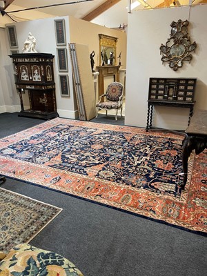 Lot 30 - A wool carpet of Persian Heriz design