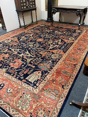 Lot 30 - A wool carpet of Persian Heriz design