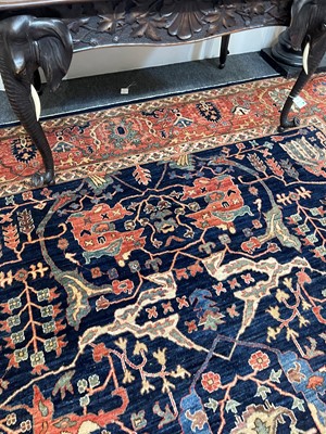 Lot 30 - A wool carpet of Persian Heriz design