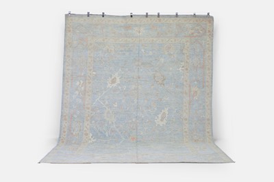 Lot 99 - An Oushak wool carpet