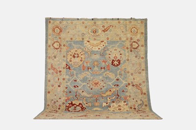 Lot 410 - An Oushak wool carpet