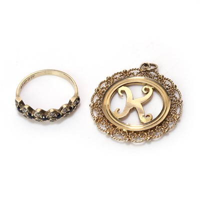 Lot 217 - A 9ct gold sapphire and diamond ring and a letter 'K' pendant