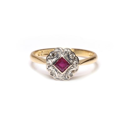 Lot 55 - An 18ct gold ruby set cluster ring