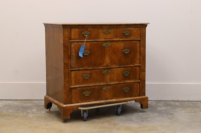 Lot 514 - A walnut chest of drawers