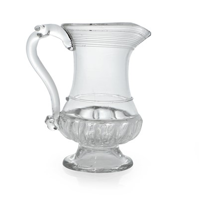 Lot 19 - A glass coin jug