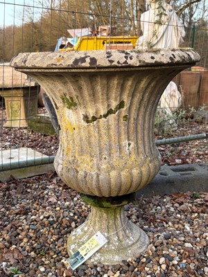 Lot 555 - A composition stone campana urn