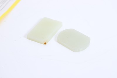 Lot 56 - Two Chinese carved and inscribed jade pendant plaques