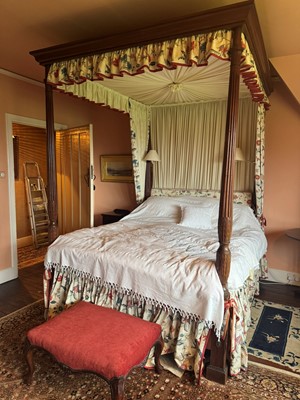 Lot 149 - A George III Hepplewhite-style four-poster bed