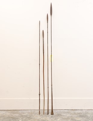 Lot 383 - Four tribal iron spears