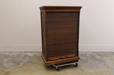Lot 530 - A tambour fronted walnut office cabinet