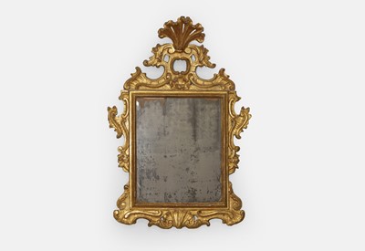 Lot 312 - A rococo giltwood wall mirror