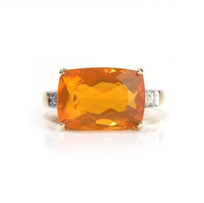 Lot 141 - An 18ct gold fire opal and diamond ring