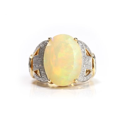 Lot 142 - An 18ct gold opal and diamond ring