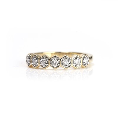 Lot 88 - An 18ct gold diamond half eternity ring