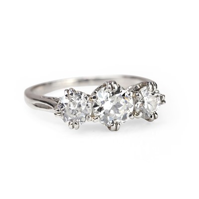 Lot 102 - A diamond three stone ring