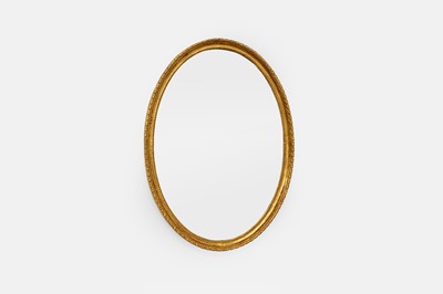Lot 612 - A small George III-style giltwood oval mirror