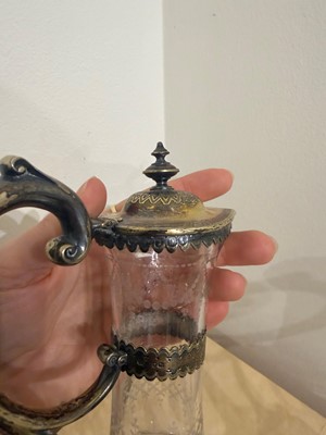 Lot 526 - A pair of Victorian etched glass and silver-gilt-mounted claret jugs