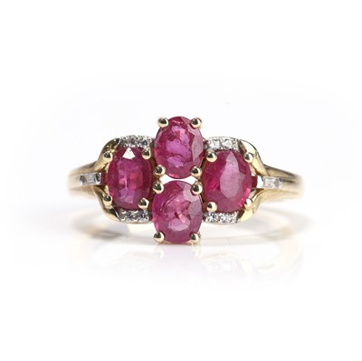 Lot 58 - A 9ct gold ruby and zircon cluster ring