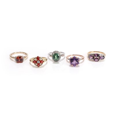 Lot 244 - A group of five gold gemstone set rings