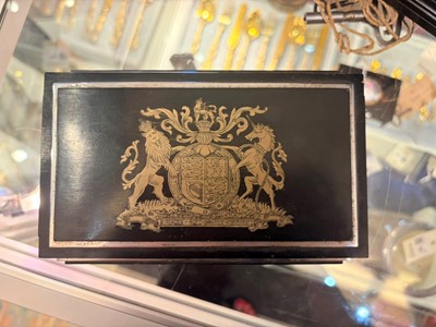 Lot 533 - An Art Deco ebonised and silver-plated cigarette box
