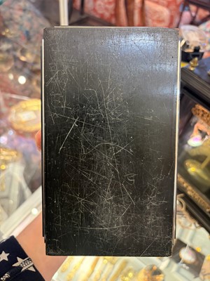 Lot 533 - An Art Deco ebonised and silver-plated cigarette box