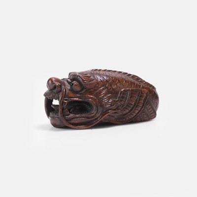 Lot 358 - A Japanese wood netsuke