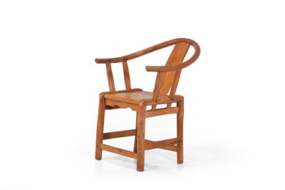 Lot 516 - A small elm horseshoe chair
