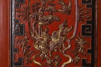 Lot 531 - A red and gilt-lacquer wedding cabinet
