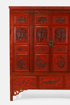 Lot 532 - A red lacquer wedding cabinet