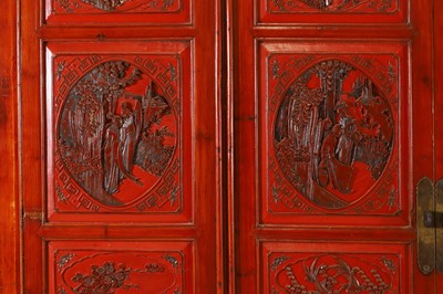 Lot 532 - A red lacquer wedding cabinet