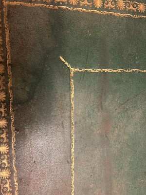 Lot 534 - A Regency ebonised and parcel-gilt writing table