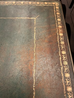Lot 534 - A Regency ebonised and parcel-gilt writing table