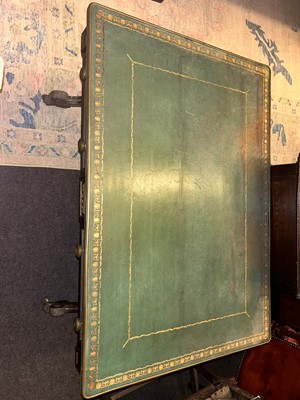 Lot 534 - A Regency ebonised and parcel-gilt writing table
